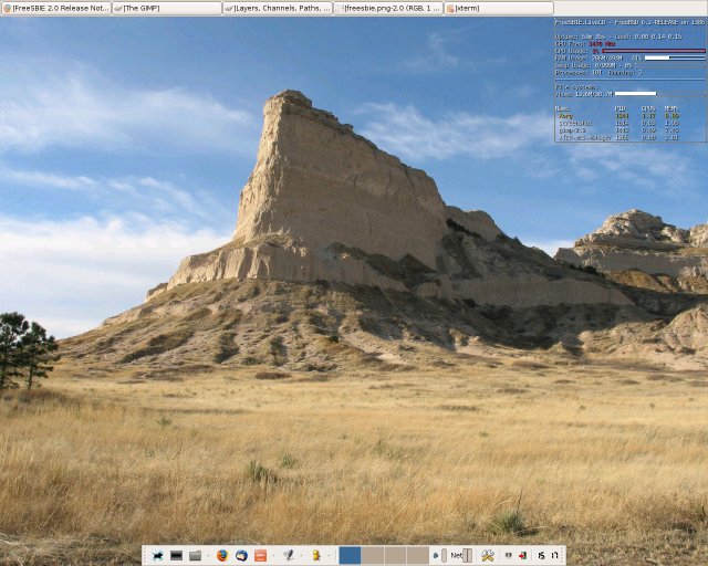 [Screenshot: FreeSBIE-Desktop mit Savannen-Landschaft als Hintergrundsbild]